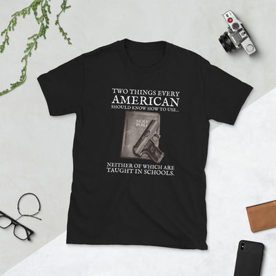 Two things every American should know how to use Gun & Bible, Neither of which are taught in school Short-Sleeve Unisex T-Shirt